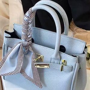 So of blue woman handbag